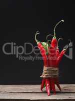 Delicious chilies on a wooden table