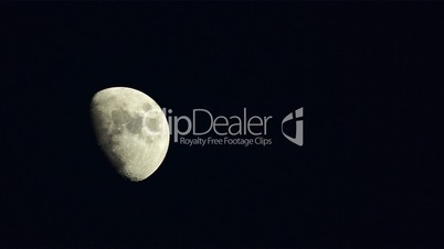 Moon in the first quarter in motion, timelapse