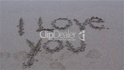 Message in the sand, I love you, sea, beach