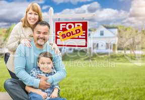 Mixed Race Family In Front of House and Sold For Sale Real Estat