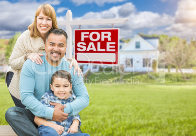 Mixed Race Family Portrait In Front of House and For Sale Real E