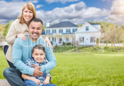Mixed Race Family Portrait In Front of House