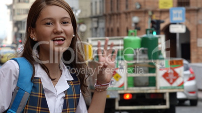 Pretty Female Student Waving