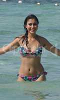 Smiling Female Wearing Bikini In Water