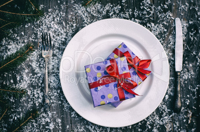 Christmas gifts on the white plate