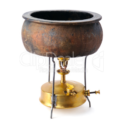 kerosene stove and a ceramic pot isolated on white background