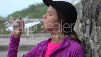 Teen Girl Drinking Water