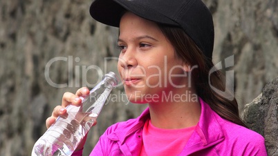 Female Teen Drinking Bottled Water