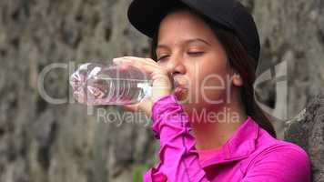 Thirsty Girl Drinking Bottled Water