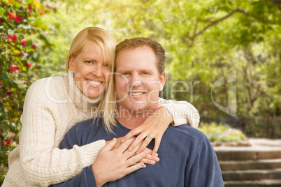 Happy Attractive Caucasian Couple in the Park