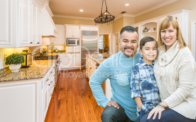 Young Mixed Race Family Having Fun in Custom Kitchen