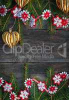Christmas gray wooden background with toys and a garland