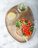 Quinoa tabbouleh salad on a wooden table