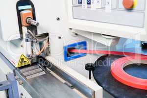 Edge banding machine in production of furniture