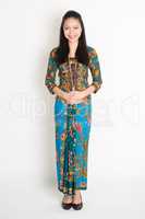 Southeast Asian girl in batik dress