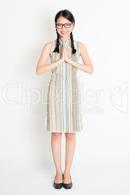 Asian girl greeting pose