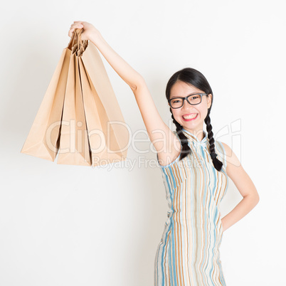 Oriental woman shopping