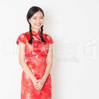 Oriental girl in red qipao