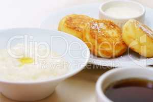 Breakfast with rice porridge and cheese pancakes
