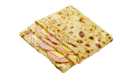 Pancake with cheese and sausage isolated on white