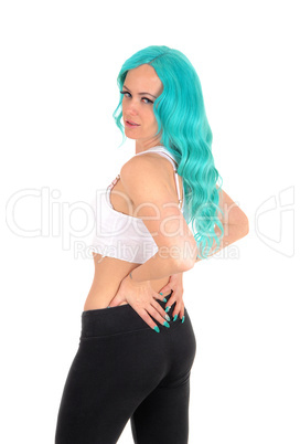 Blue hair woman looking over shoulder.