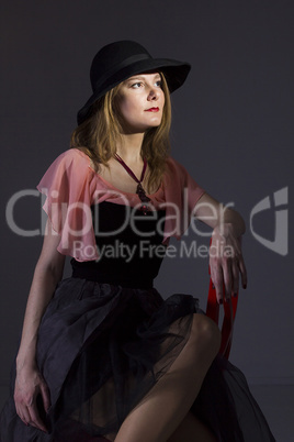 Portrait of a young woman in a hat