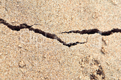 the crack on the sand, sea sand, shore sand, colored sand