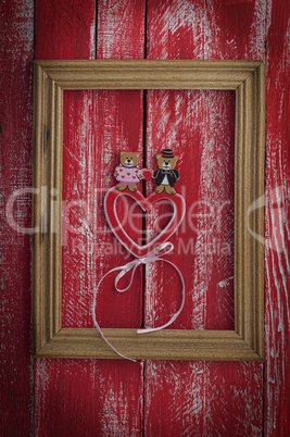 Festive red background with a wooden frame