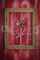 Festive red background with a wooden frame