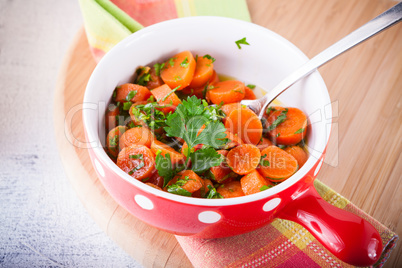 Baby carrots cooked with garlic, honey and parsley
