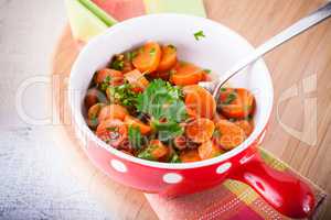 Baby carrots cooked with garlic, honey and parsley