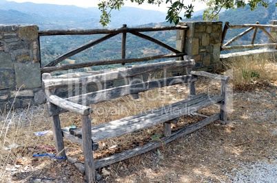 A bench in a garden .