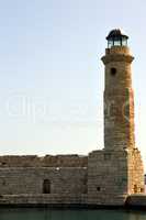 Marine lighthouse in a port of Crete.