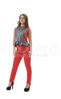 Young pretty girl in red slinky pants in studio