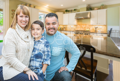 Mixed Race Young Family Inside Kitchen of House