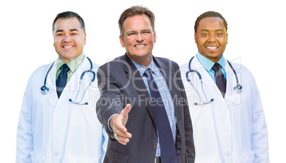 Mixed Race Doctors Behind Businessman Reaching for Hand Shake on