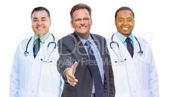 Mixed Race Doctors Behind Businessman Reaching for Hand Shake on