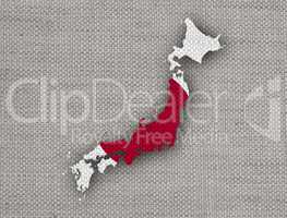 Karte und Fahne von Japan auf altem Leinen