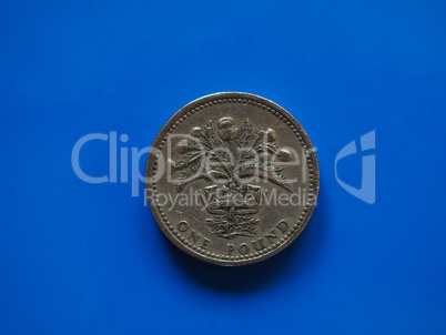 One Pound (GBP) coin, United Kingdom (UK) over blue