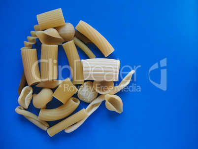 Traditional Italian pasta, blue background with copy space