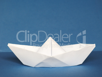 paper boat over blue