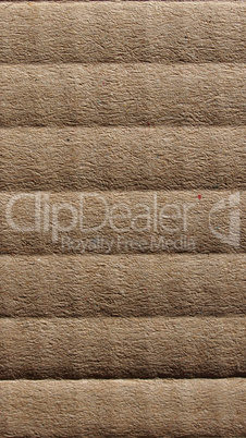 Brown corrugated cardboard background - vertical