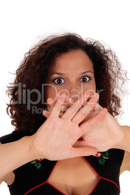 Shocked woman with hand over mouth.