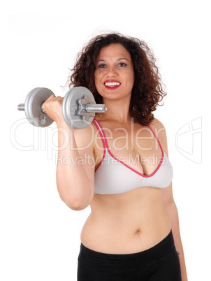 Busty woman with dumbbells.