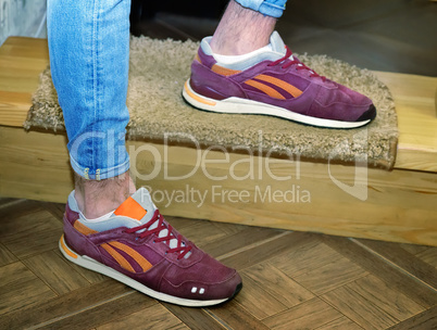 Young man in sneakers and jeans