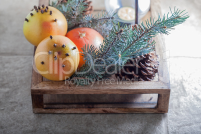 Christmas oranges in wooden box