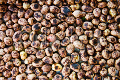 Background of a heap of roasted peanuts.