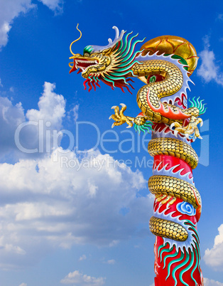 Dragon statue with the blue sky field.