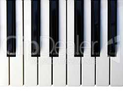 Closeup detail of a piano keyboard.