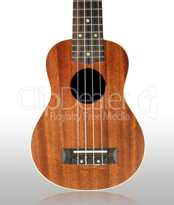 Close-up ukulele isolated over white background.